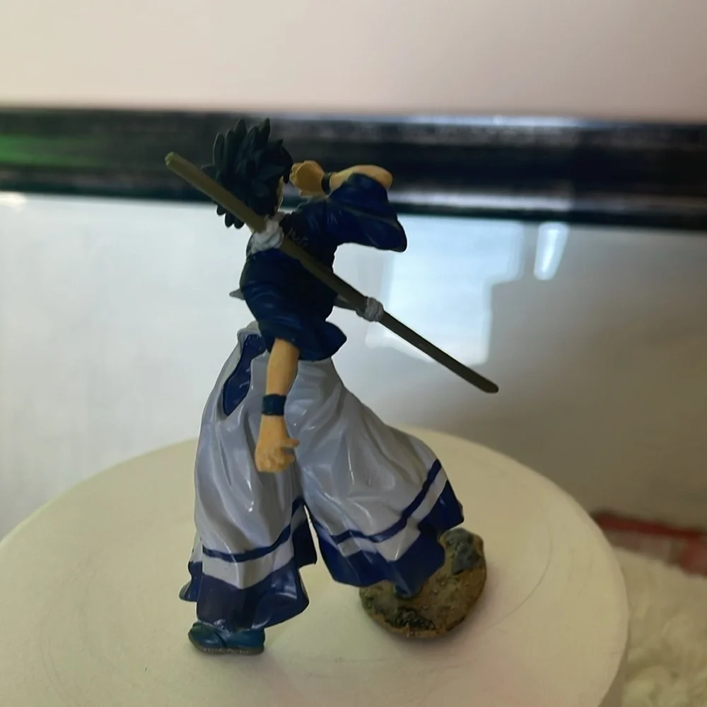Dynamic Warrior Figurine in Blue and White